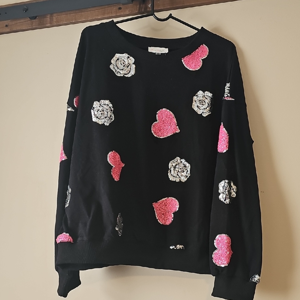 Fantastic Fawn Black Sweater with Pink and White Patterns
